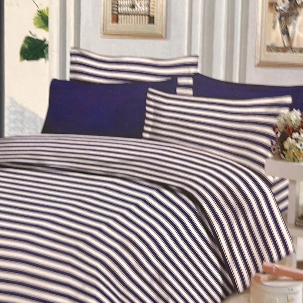 Traditional At Home 4 pc Twin Sheet Set Purple Passion and white stripes.